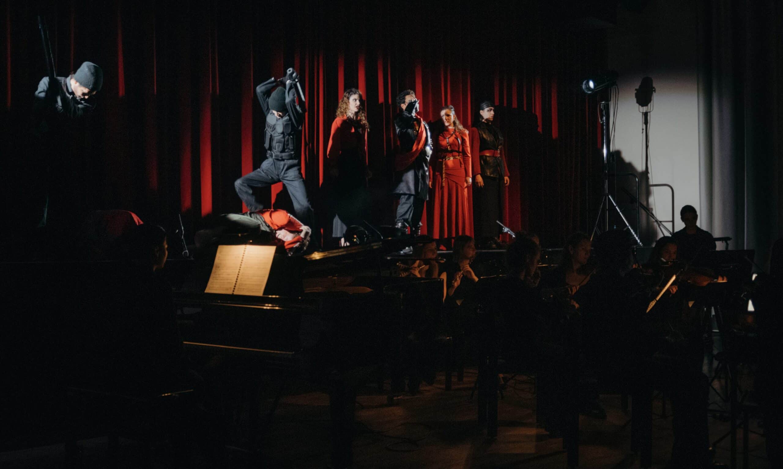 The uprising is crushed; Pilate’s security forces, batons at the ready, seize the instigators – death looks them straight in the eyes. Volkshaus, Biel, April 2023. (© Maria Tkachuk)